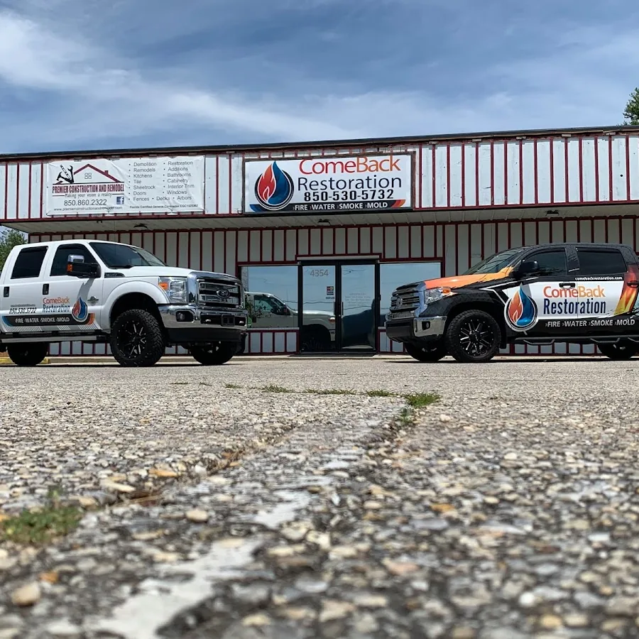 ComeBack Restoration headquarters and branded fleet trucks at 4354 Gulf Breeze Pkwy