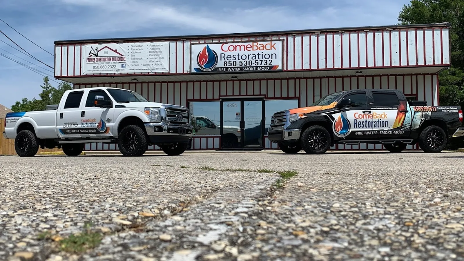 ComeBack Restoration, LLC storefront and branded fleet trucks at 4354 Gulf Breeze Pkwy